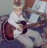 Jeff playing guitar at
8 years old